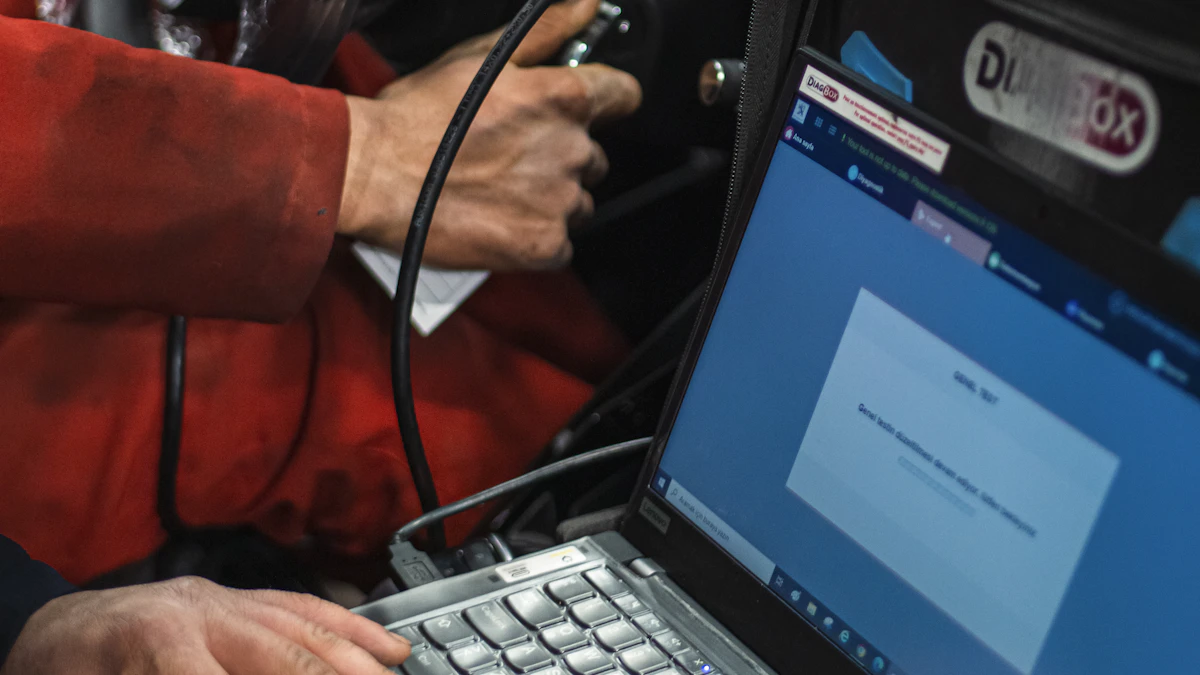 Technician using a digital diagnostic computer connected to a vehicle